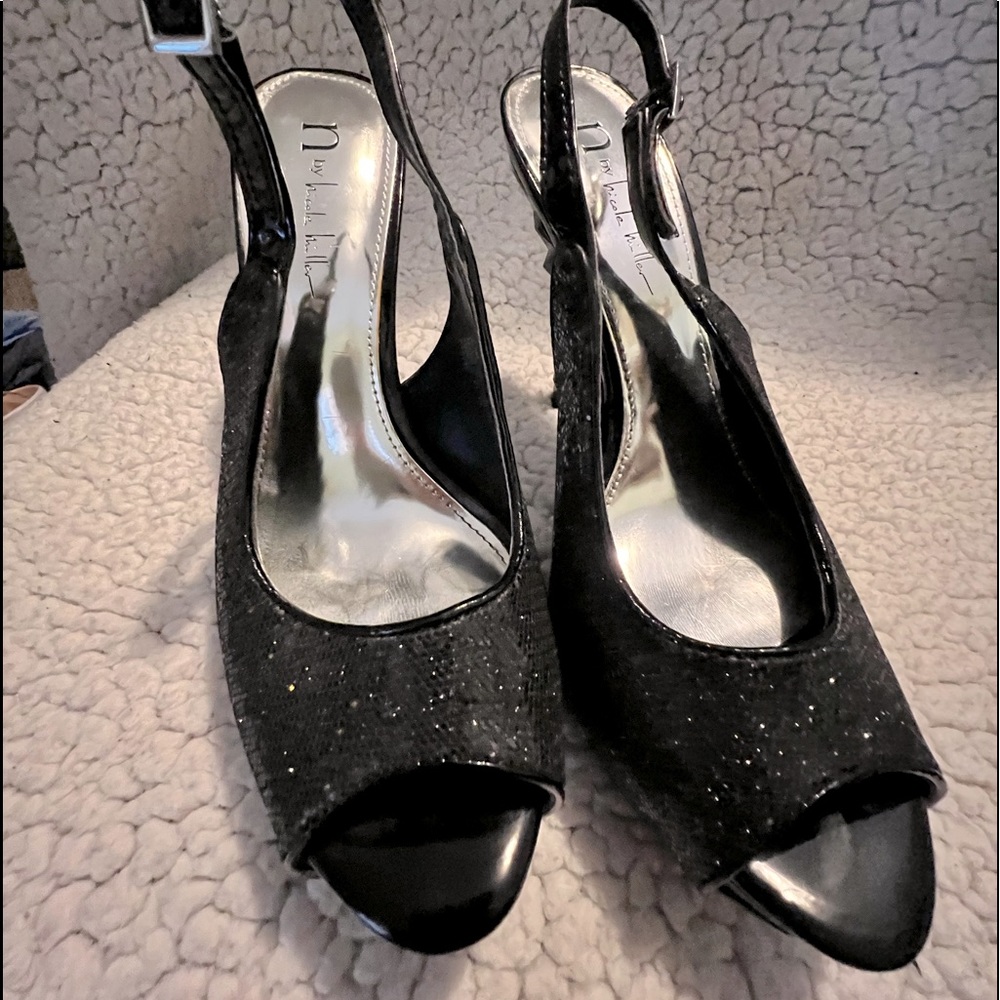 Nicole Miller, size 7, black color.